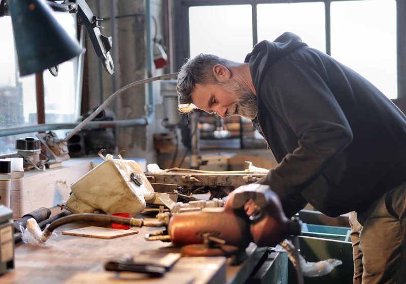 An owner working in his own workshop